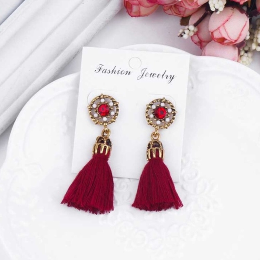 Red jeweled tassel earrings
